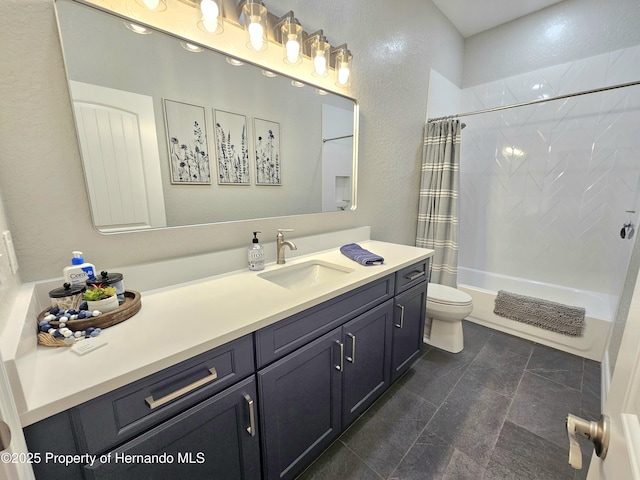 full bathroom featuring vanity, toilet, and shower / tub combo