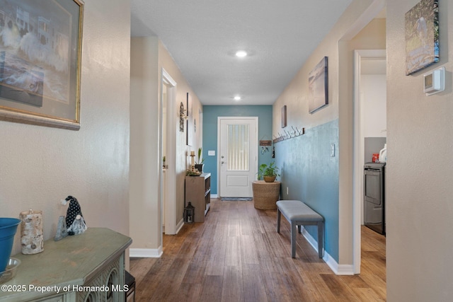 hallway with wood-type flooring