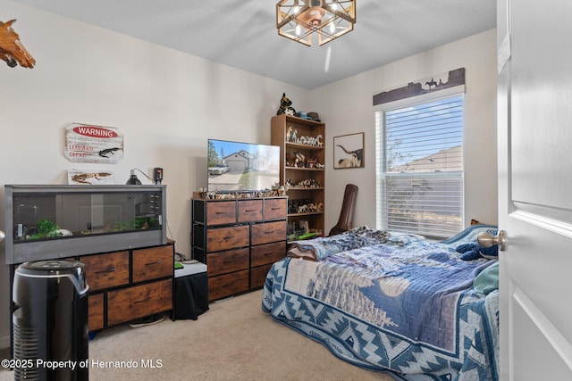 bedroom featuring light colored carpet