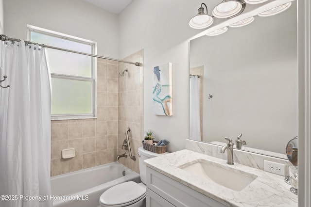 full bathroom with shower / tub combo with curtain, vanity, and toilet