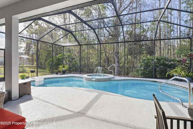 view of pool with glass enclosure, an in ground hot tub, and a patio