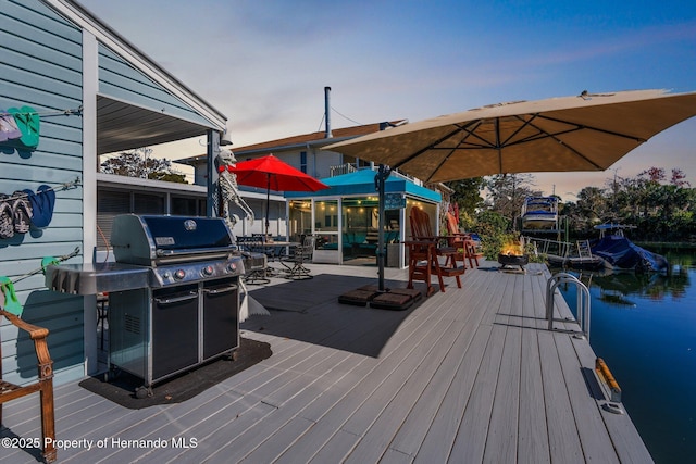 dock area featuring a water view