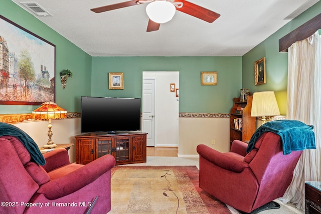 living room featuring ceiling fan