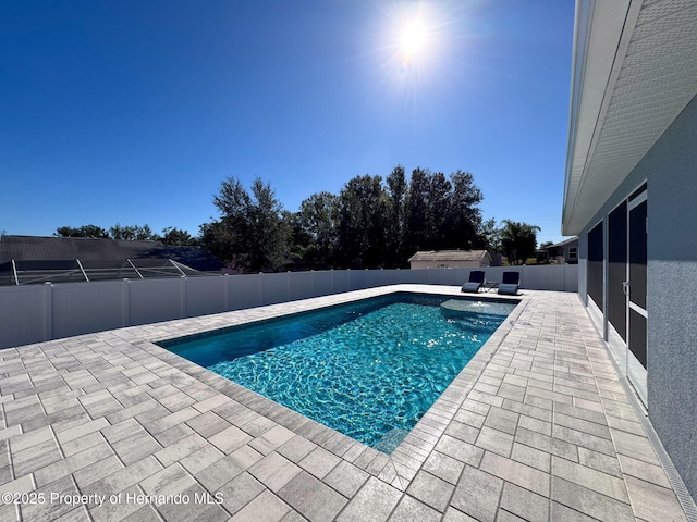 view of pool with a patio