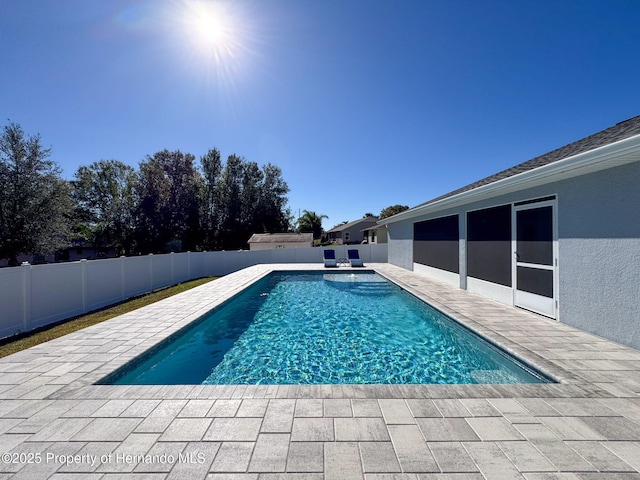 view of pool featuring a patio