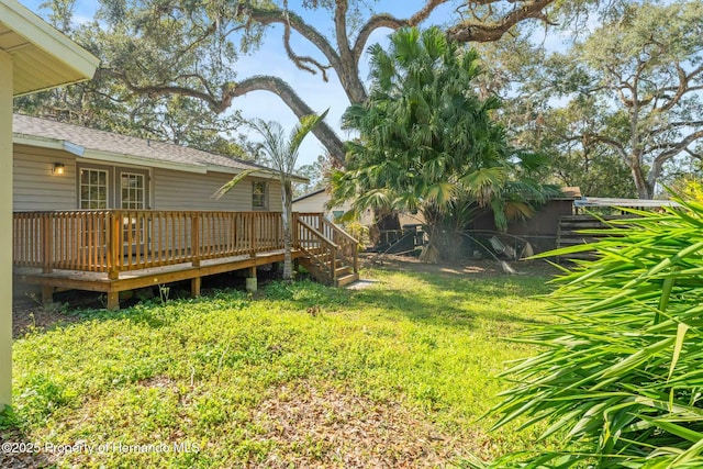 view of yard with a deck