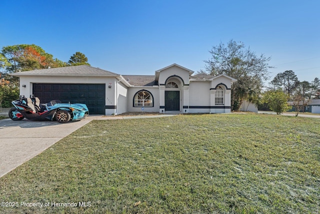 single story home with a garage and a front lawn