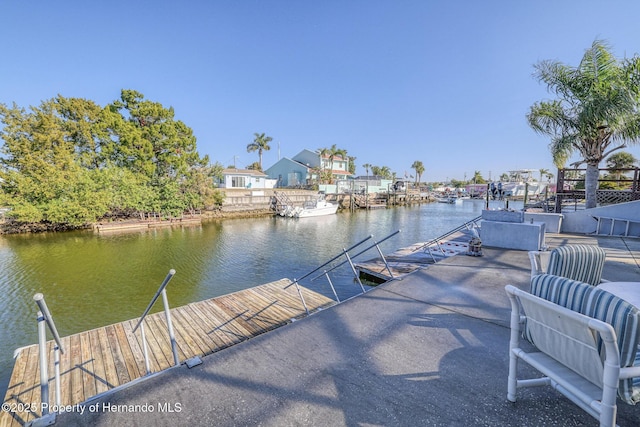 dock area featuring a water view