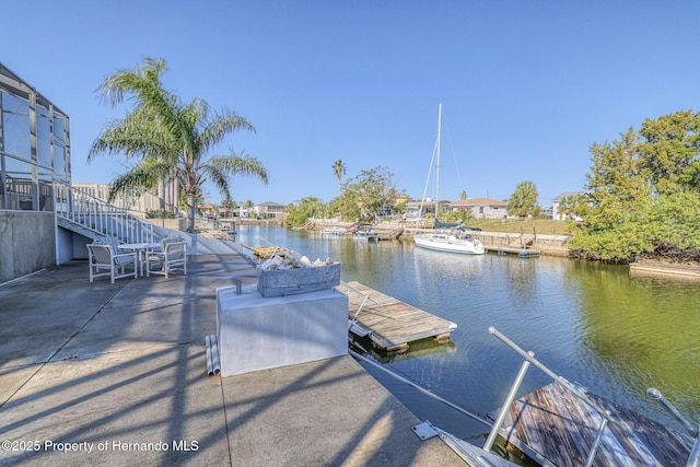 dock area featuring a water view