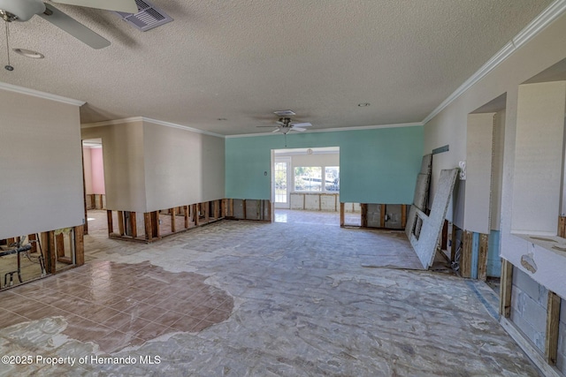 unfurnished living room featuring a textured ceiling, ceiling fan, and crown molding