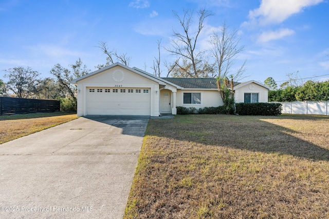 ranch-style house with a front lawn and a garage