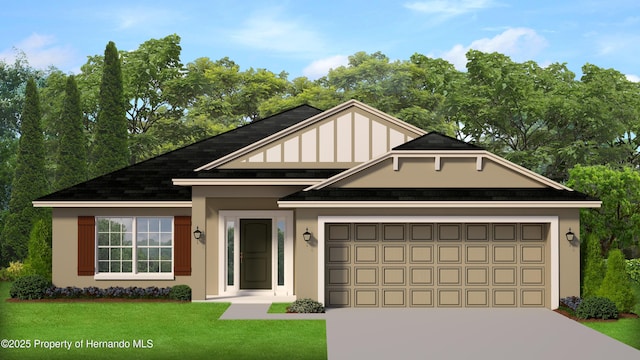 view of front facade with a garage and a front lawn