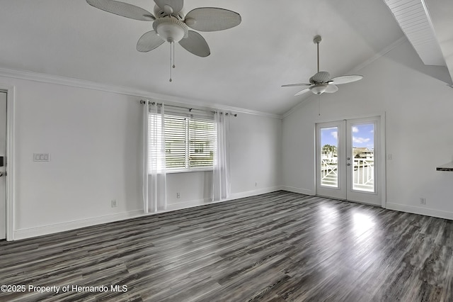 spare room featuring ceiling fan, dark hardwood / wood-style flooring, french doors, and vaulted ceiling