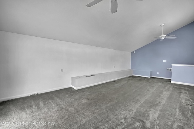 interior space featuring ceiling fan and vaulted ceiling