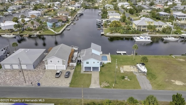 bird's eye view with a water view