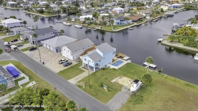 drone / aerial view with a water view