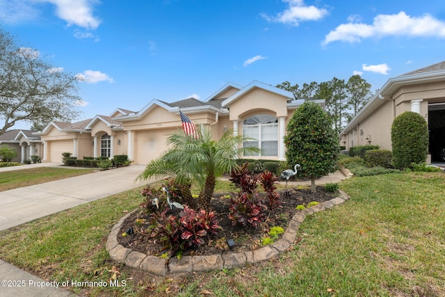 single story home featuring a front lawn and a garage