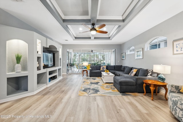 living room featuring coffered ceiling, light hardwood / wood-style floors, beamed ceiling, ceiling fan, and built in shelves