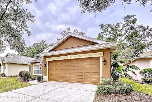 single story home featuring a garage