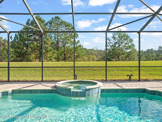 view of pool with glass enclosure, an in ground hot tub, and a lawn