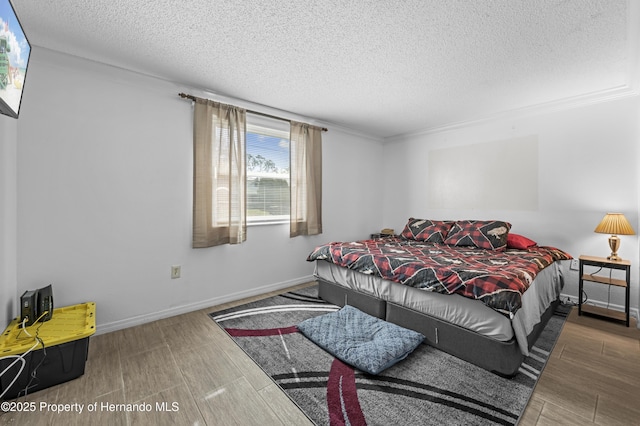 bedroom featuring a textured ceiling