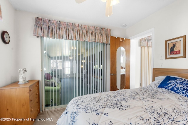 bedroom featuring ceiling fan and carpet flooring