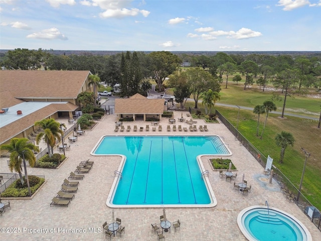 view of swimming pool featuring a patio