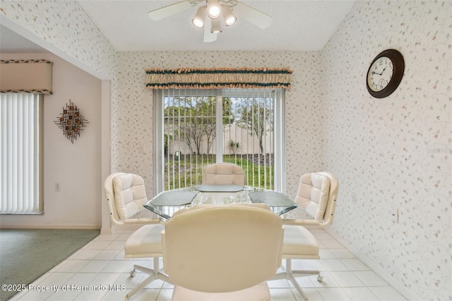 dining area featuring ceiling fan and light tile patterned floors