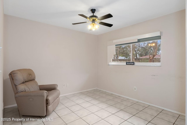 living area featuring ceiling fan