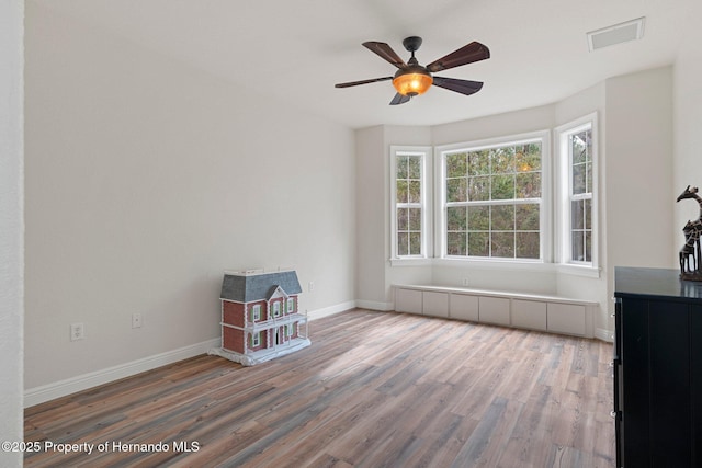 interior space featuring ceiling fan and hardwood / wood-style floors