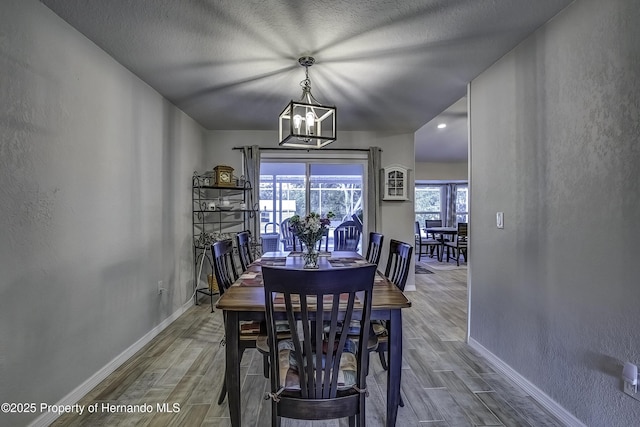 dining room with a chandelier