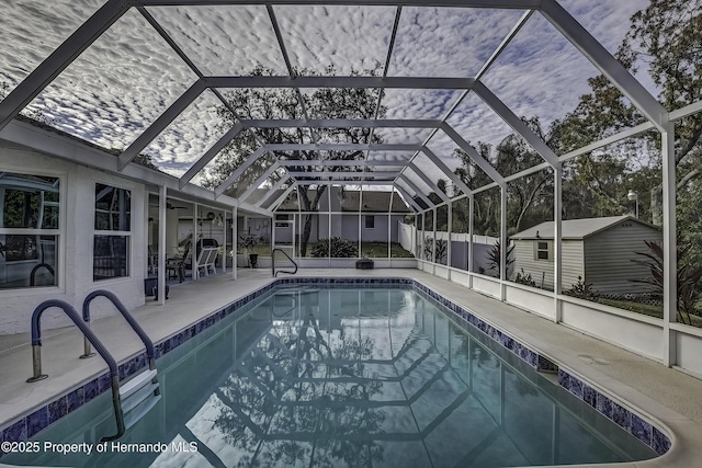 view of pool featuring a lanai and a patio area