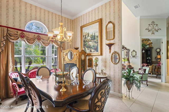 dining space with crown molding, an inviting chandelier, and light tile patterned floors