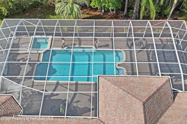 view of pool featuring a lanai and a patio area