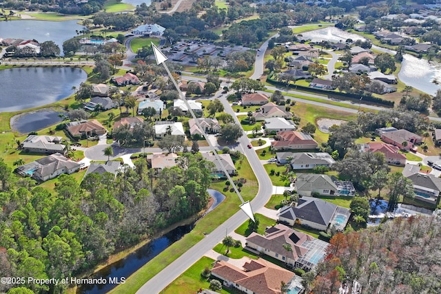 drone / aerial view with a water view