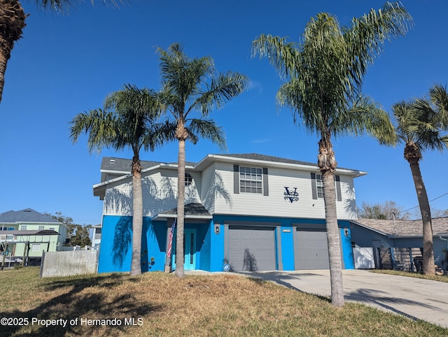 front of property with a garage