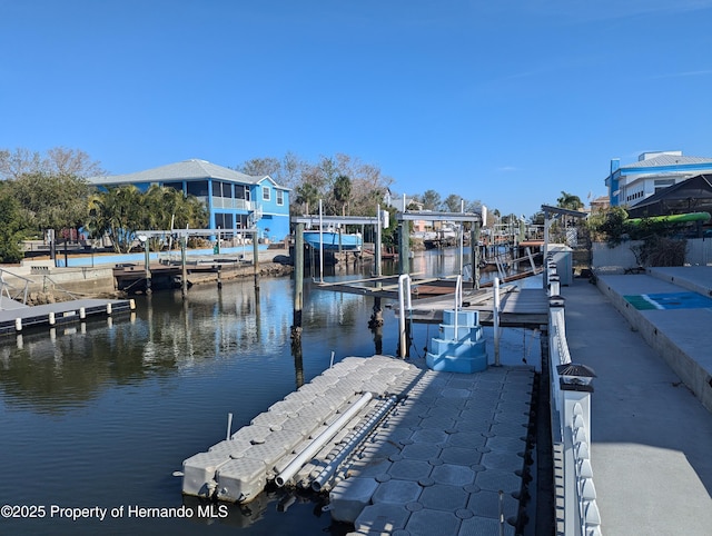 dock area featuring a water view