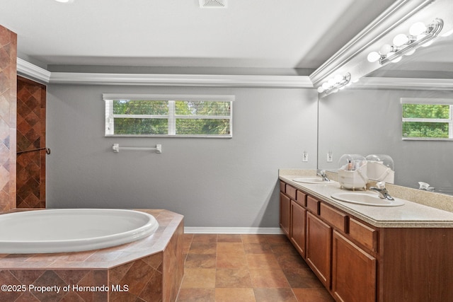 bathroom with vanity and a relaxing tiled tub