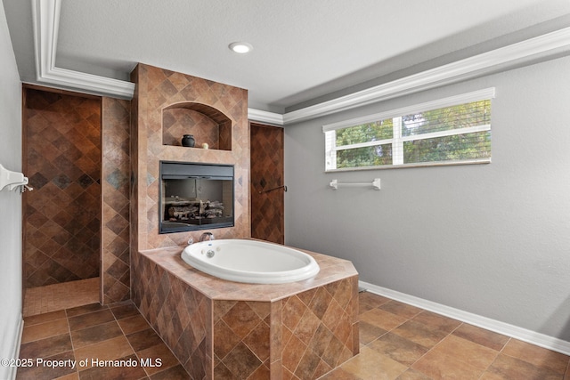 bathroom featuring independent shower and bath