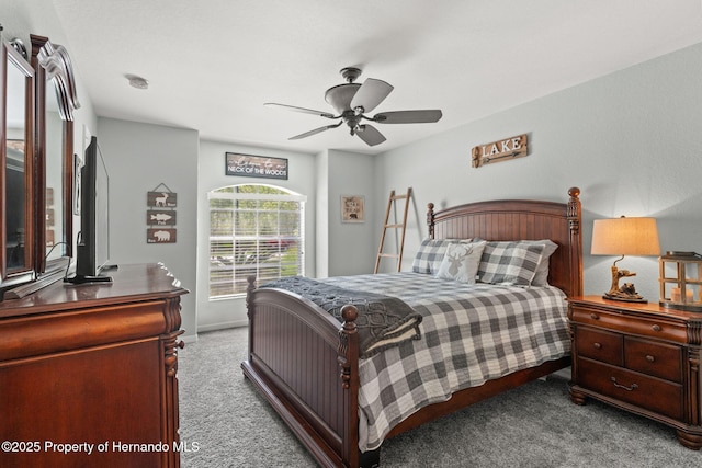 carpeted bedroom with ceiling fan