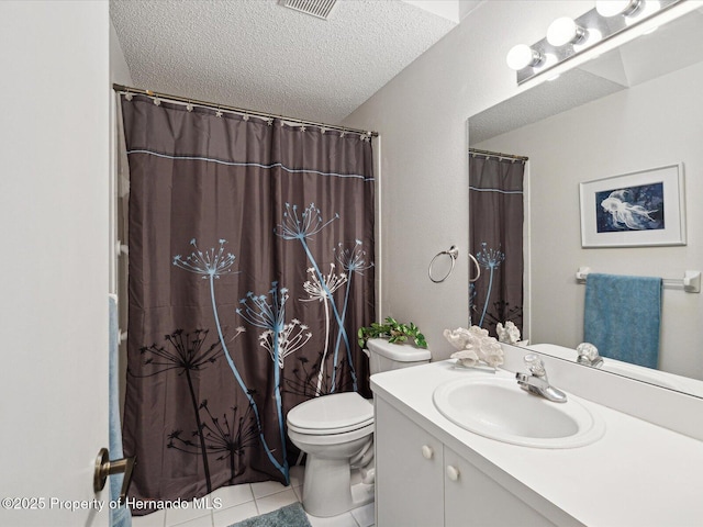 bathroom with vanity, toilet, tile patterned floors, a textured ceiling, and a shower with shower curtain