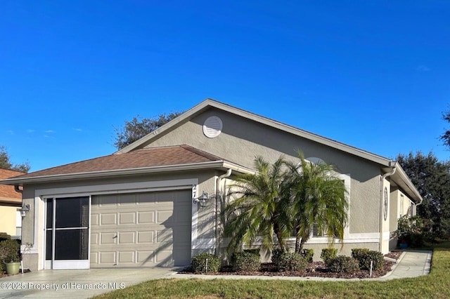 view of home's exterior featuring a garage