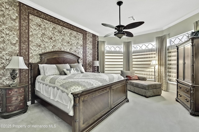 bedroom with ceiling fan, light carpet, and ornamental molding