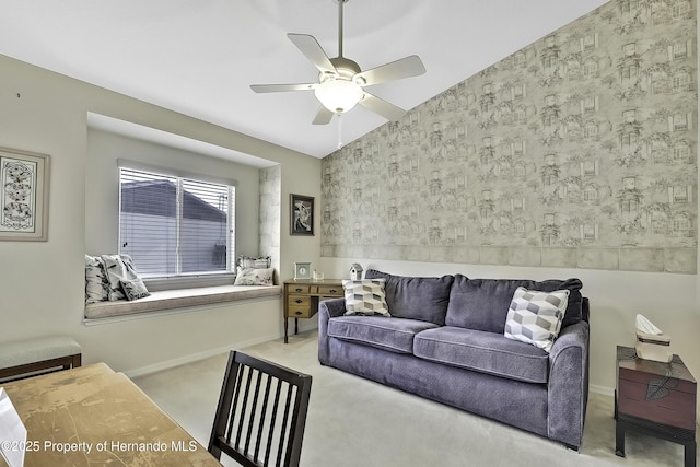 living room featuring ceiling fan and carpet floors