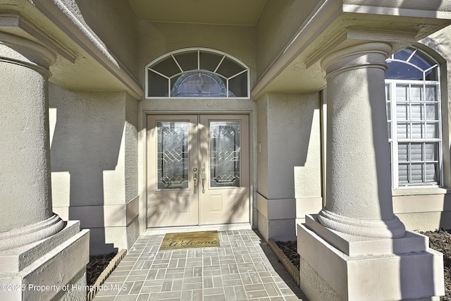 doorway to property with french doors