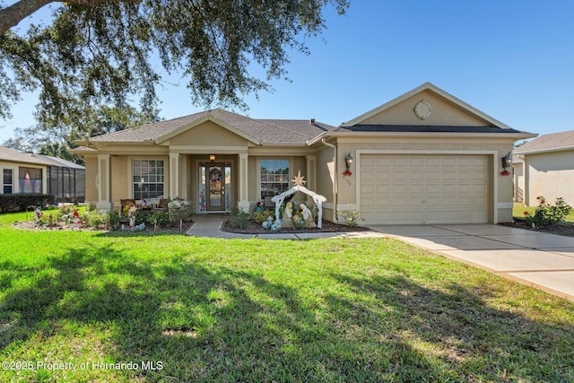 ranch-style home with a front yard and a garage