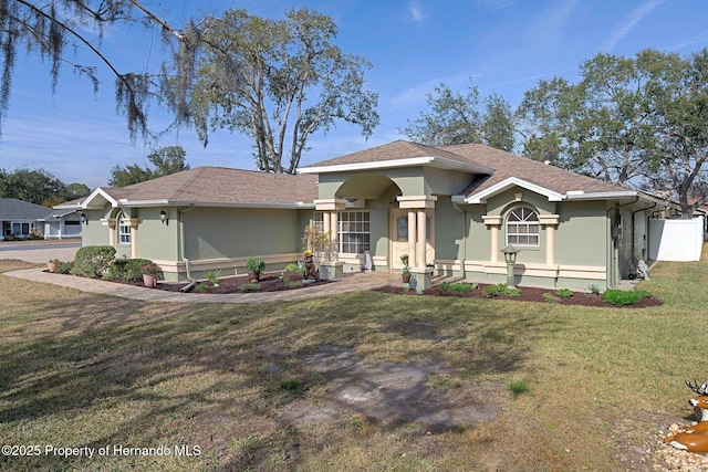 view of front of house with a front lawn