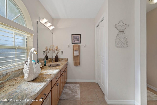 bathroom featuring vanity and tile patterned flooring