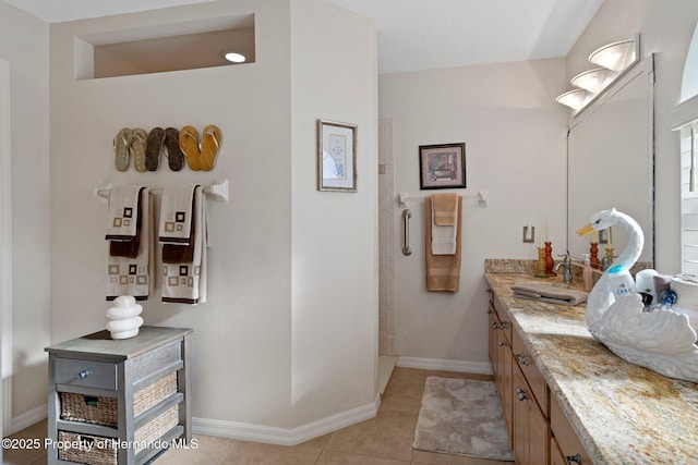 bathroom with vanity and tile patterned flooring