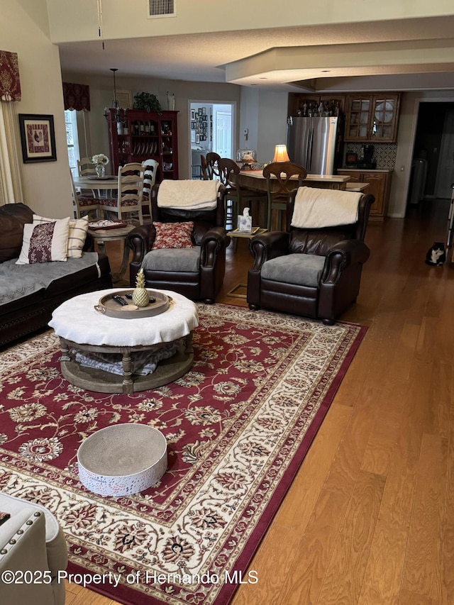 living room with wood-type flooring